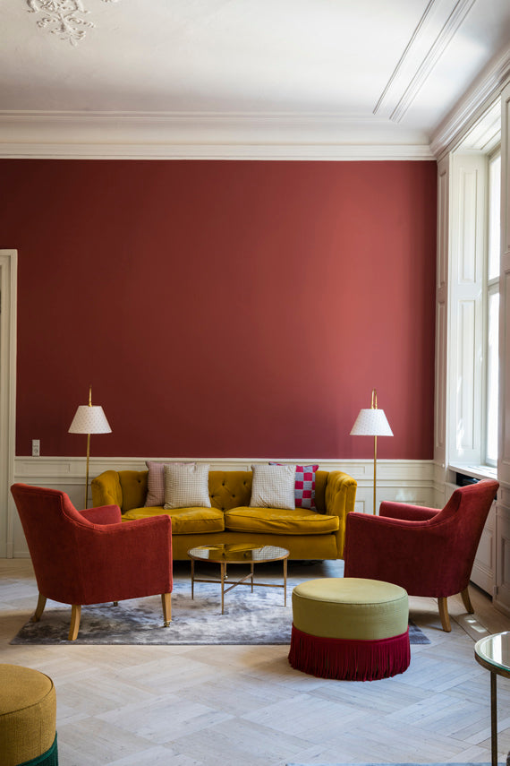 A beautiful red paint colour shown on a wall.