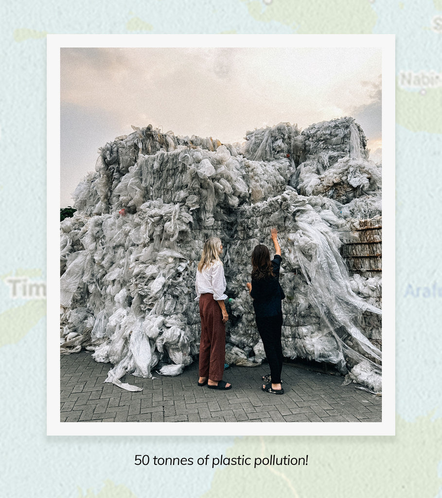 Photo of bales of plastic pollution, ready for recycling. Bales are taller than human height, representing 50 tonnes of plastic pollution