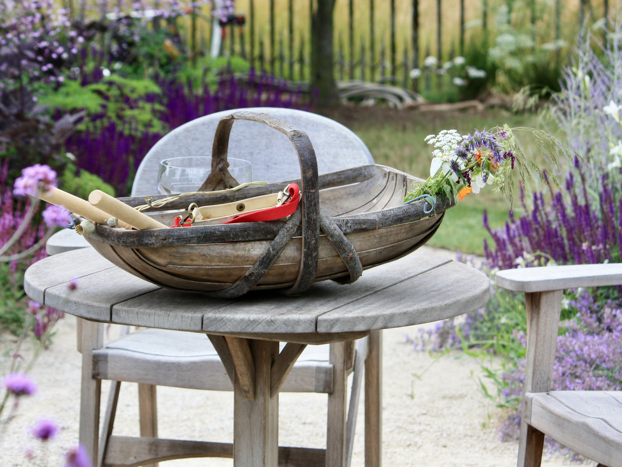 Traditional garden trug on table, Hampton Court Flower Festival 2023
