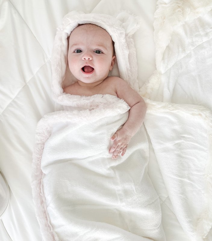 Baby wrapped in baby towel