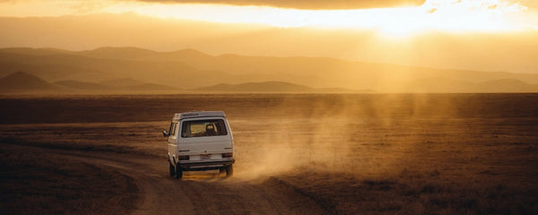 Van driving into the sunset