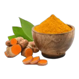 Bright orange Turmeric in a white bowl