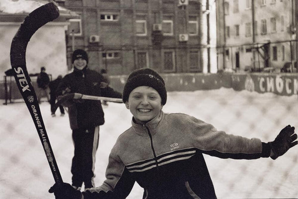 boy with hockey stick