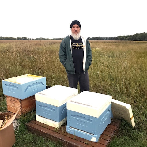 John Russell and his hive boxes