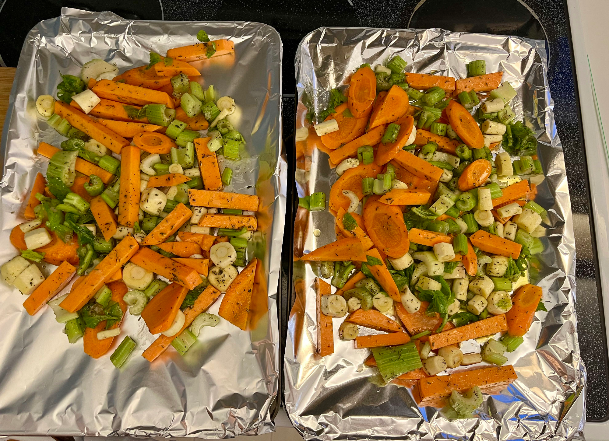 Vegetables on foiled pans.