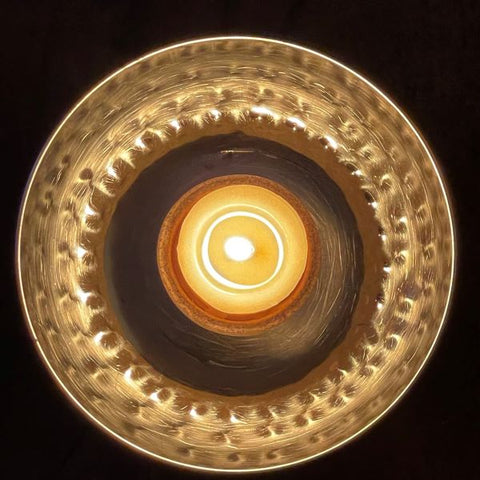 Beeswax tealight candle with a warm, soft and relaxing glow.