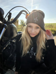 Alex wearing organic 'My Heart belongs' hoodie & beanie from Brap Culture Club