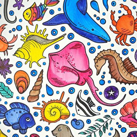 A silicone colouring mat featuring underwater creatures that demonstrates a colour shading technique.