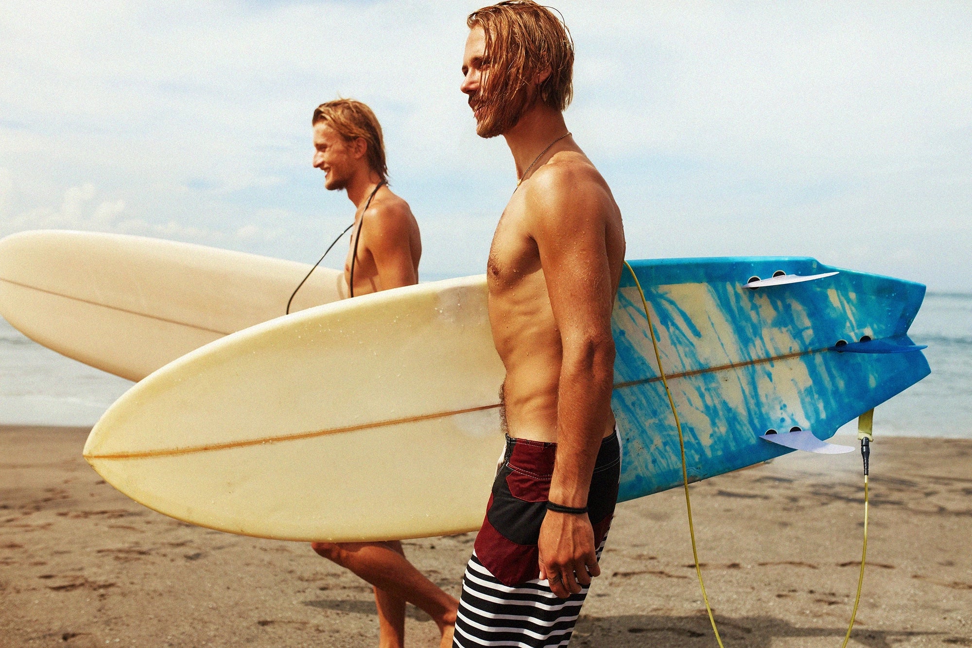 men surfing