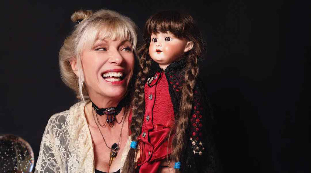 halloween season; Patti Negri with a doll