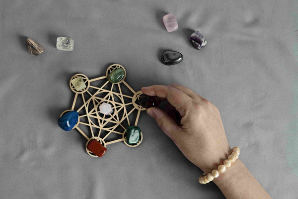 Power of crystals, person creating a crystal grid.