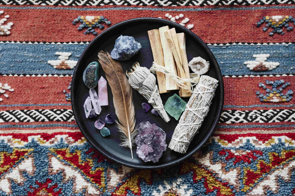 Power of crystals, a bowl of crystals and sage.