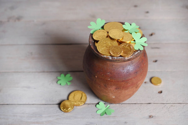 Magic of St. Patrick’s Day, a pot of gold coins.