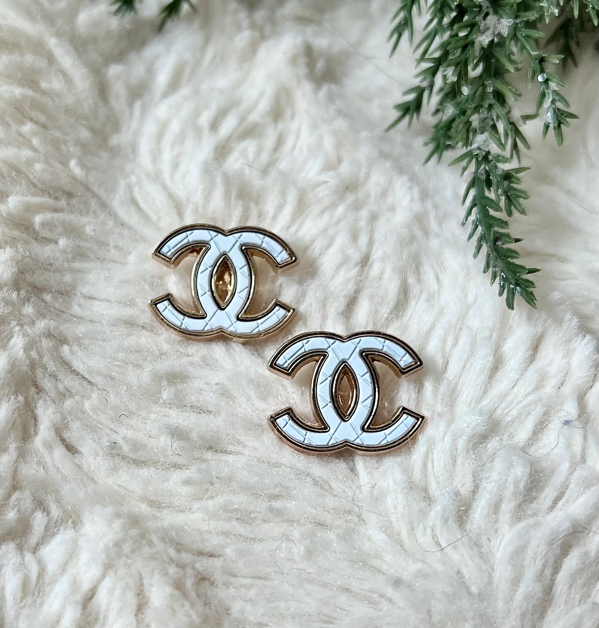 cc stud white earrings