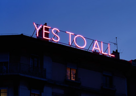 Neon Sign On A Roof