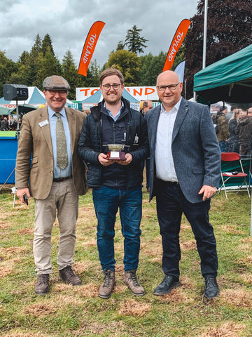 Our MD, Alex, receiving The Angus Mackenzie Memorial Quaich for Best Stand