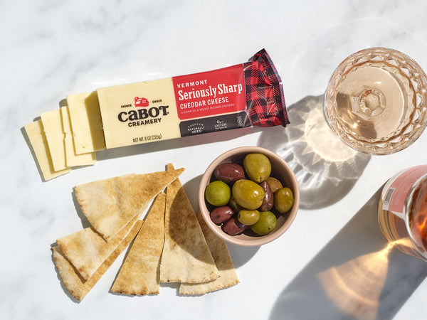 Seriously Sharp Cheese, pita wedges and olives