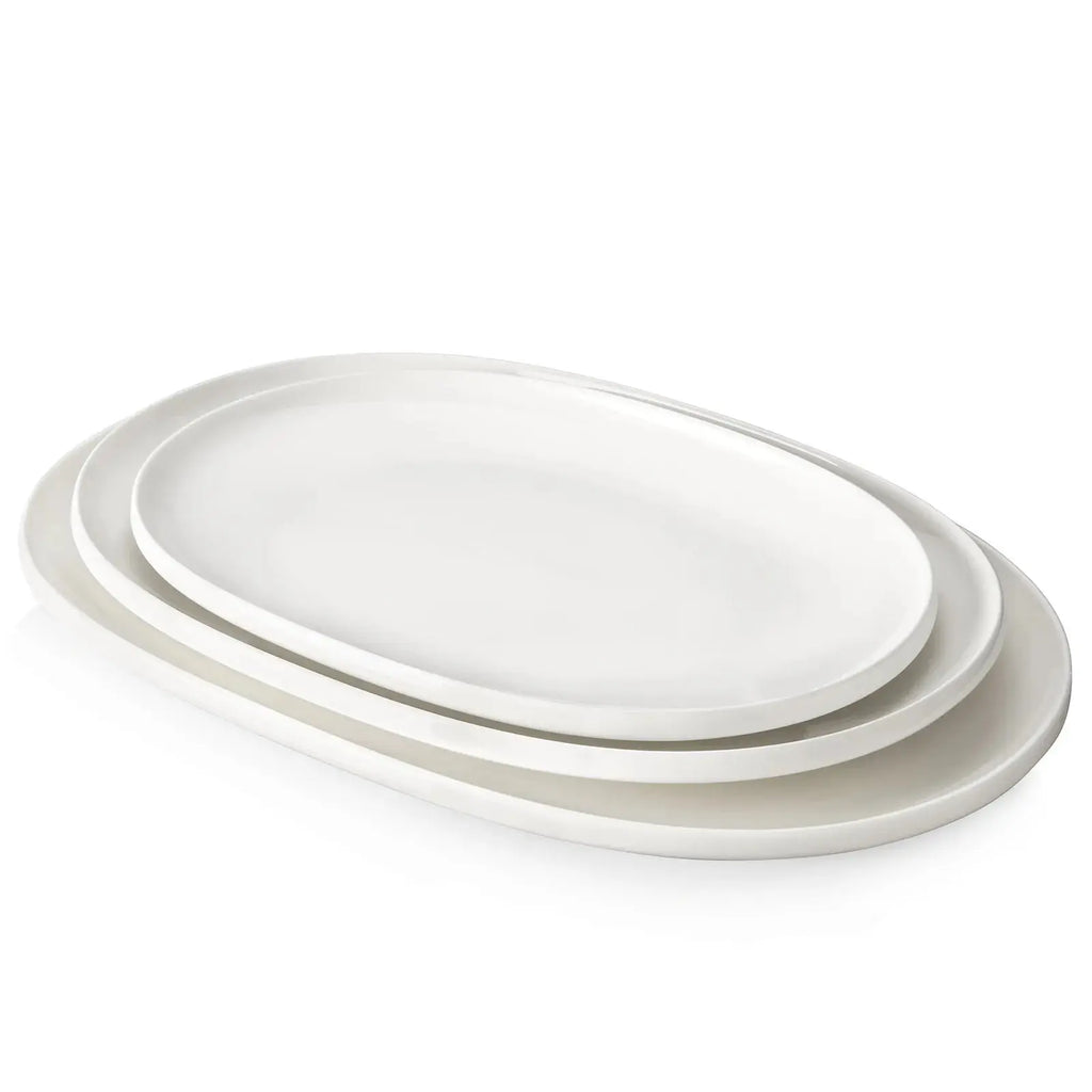 https://cdn.shopify.com/s/files/1/0571/4188/7134/products/White-Oval-Mixing-Serving-Platters---Set-of-3-Dowan-1661165846_1024x1024.webp?v=1661165848