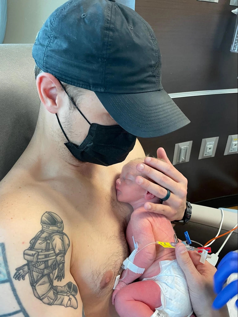 Dad practices skin-to-skin in the NICU. Photograph by Quincey Carroll