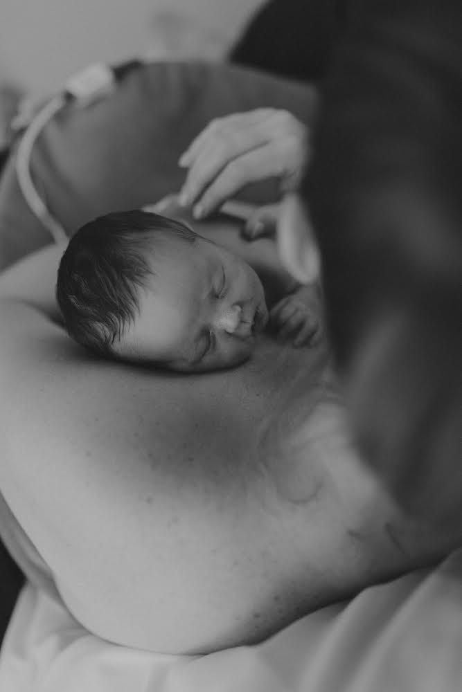 Mandi and Sawyer practice skin-to-skin contact in the hospital.