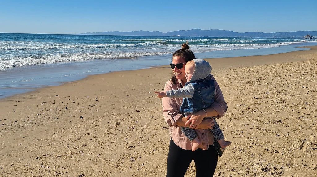 Jessy and her son at the beach.