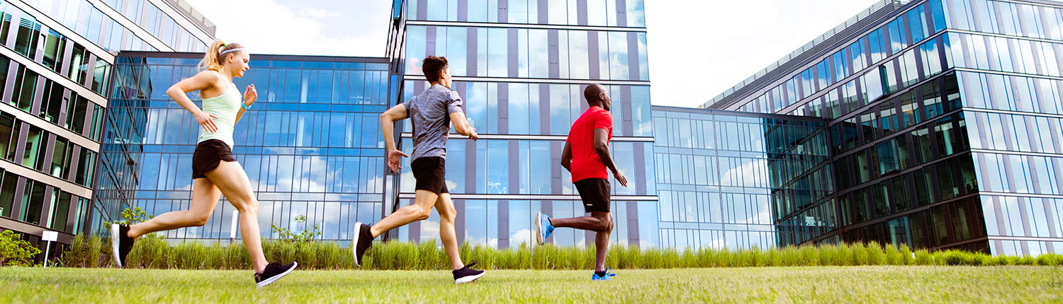 Employees exercising during their lunch break part of employee wellness program