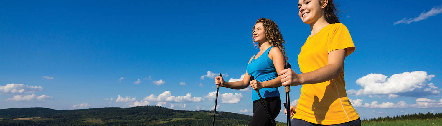 2 Women completing a walking challenge for achieving their health goals