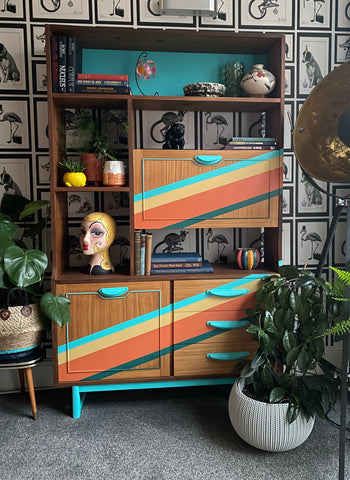 Mid century room divider painted with a retro rainbow design