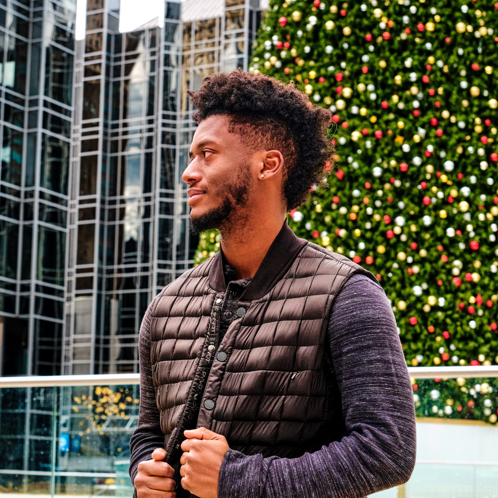 man wearing a black  vest