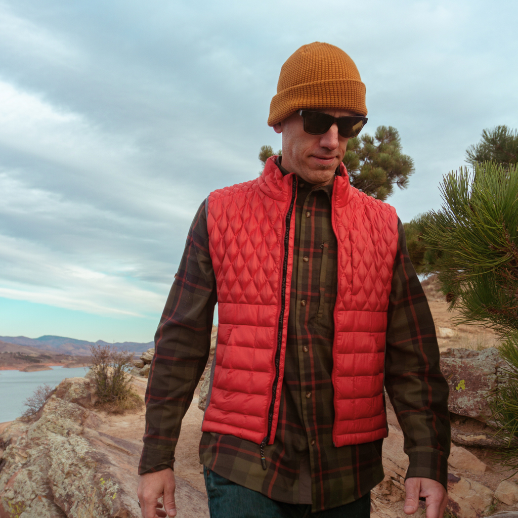 man wearing red  Pyvot Weighted  Vests and orange hat