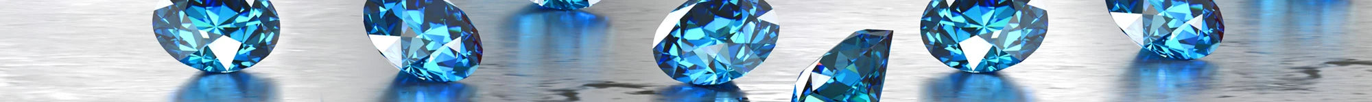 Blue Topaz: December Birthstone Guide by J. David Jewelry