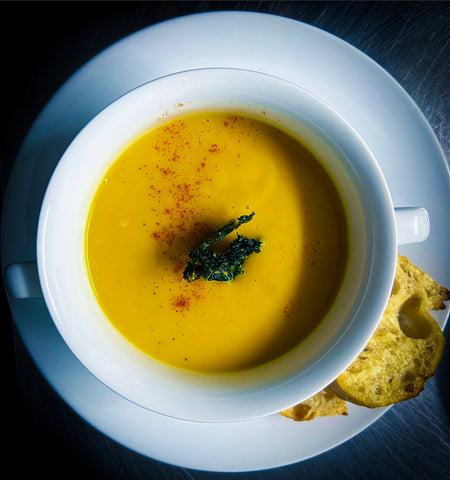 Roasted Butternut Squash Soup in white bowl up close 