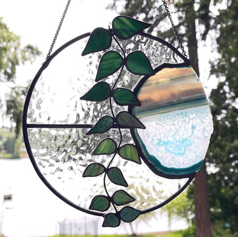 Final layered stained glass product with teal agate slice and ivy 