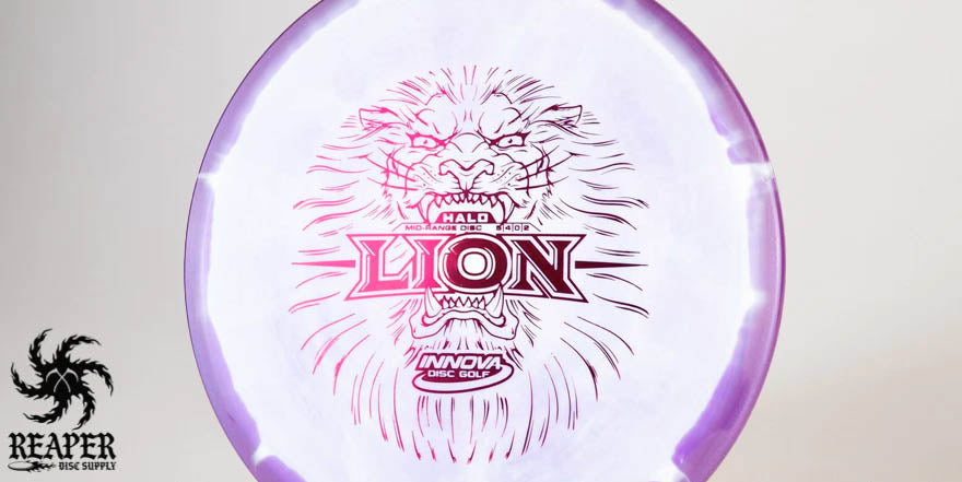 An Innova Halo Star Lion with blue rim and pink holo stamp