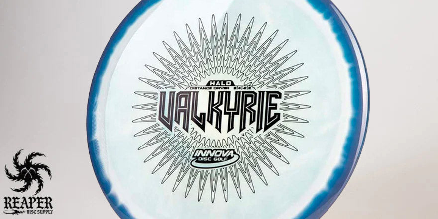 An Innova Halo Star Valkyrie disc golf disc with blue rim and black stamp