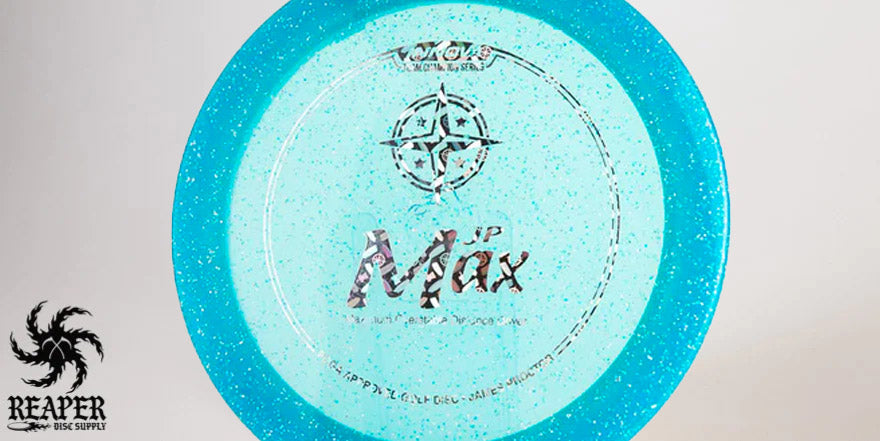 A blue Innova Metal Flake Max James Proctor disc with studio lighting