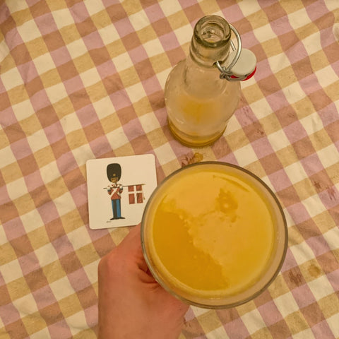 orange pineapple soda in a glass