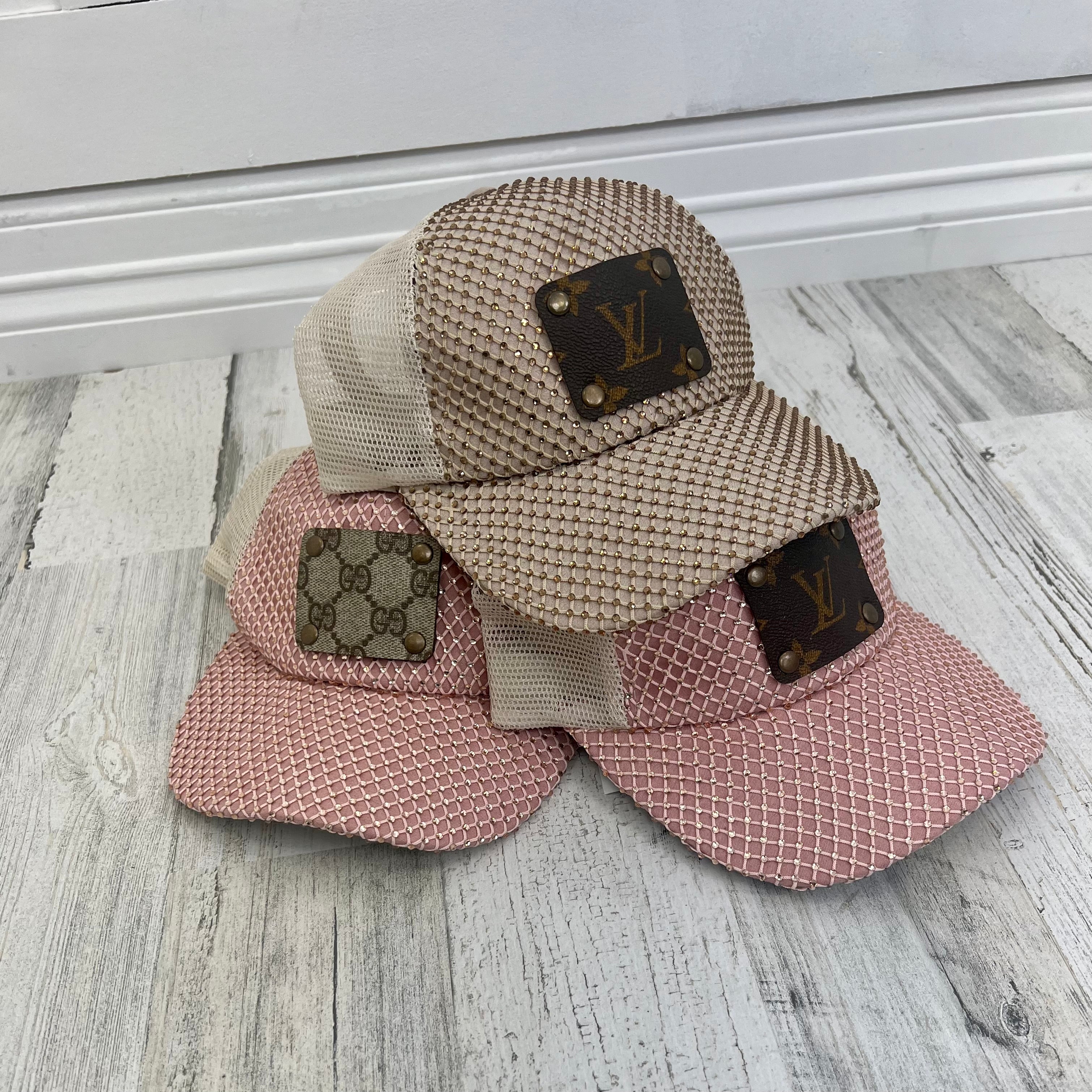 Black distressed hat with upcycled LV patch