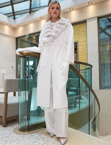 white long coat made of cashmere Loro Piana double face combined with white detachable chinchilla shawl collar.