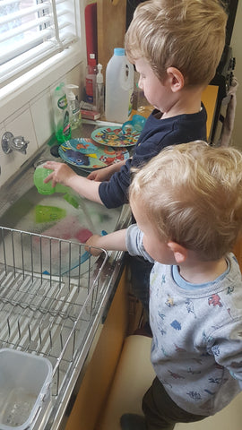 kids washing the dishes sensory water play activity