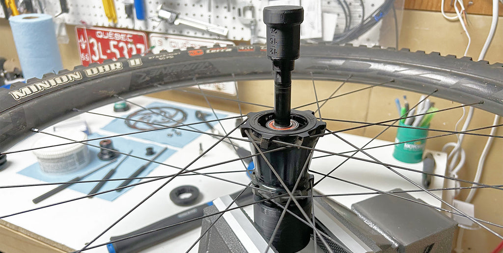 Rear wheel maintenance using our sturdy 3D printed Hub Support and Wheel Hub Axle Removal Tool.