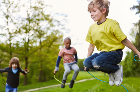 kids playing Jump rope one of the outdoor activities to keep toddlers and kids busy