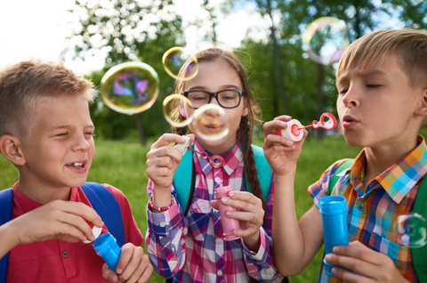 kids  bubble-blowing one of the outdoor activities to keep toddlers and kids busy