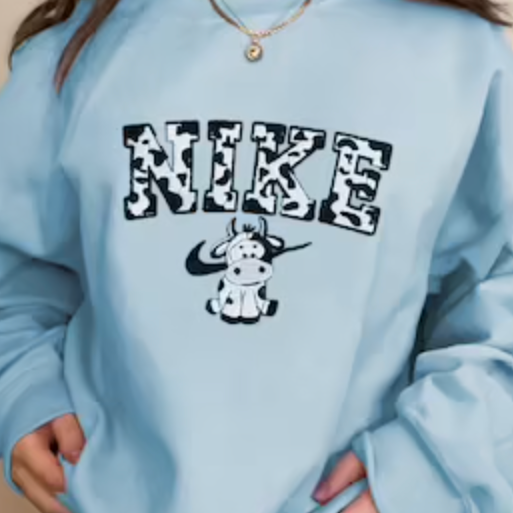 nike cow crewneck