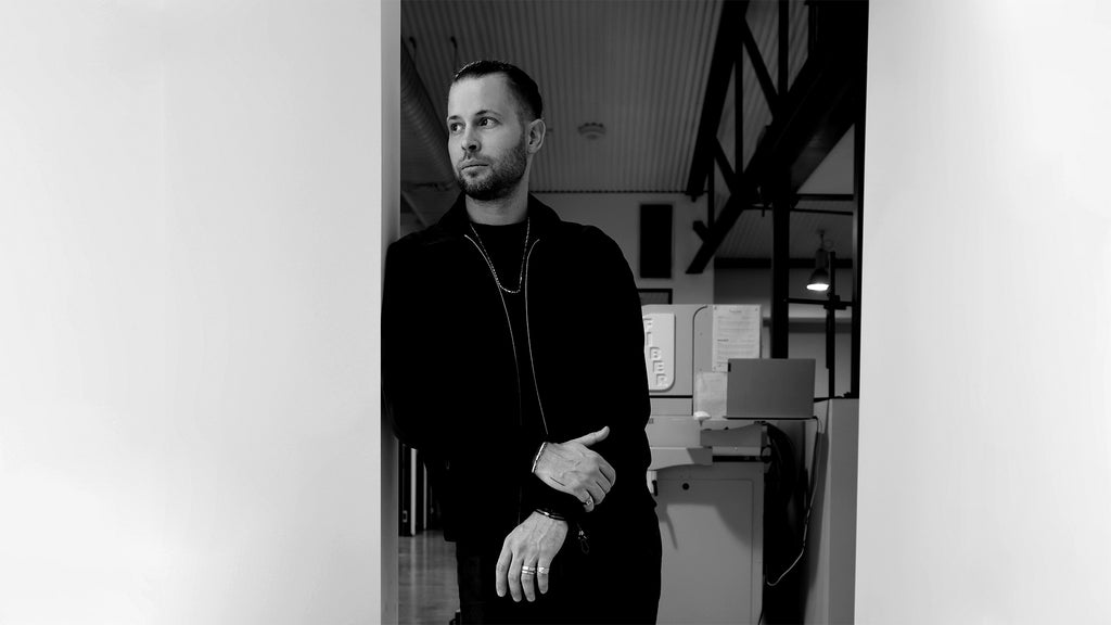 Co-founder Robert Sebastian Grynkofki stands in Sarah & Sebastian's Sydney studio