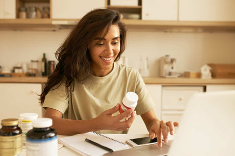 A young girl with dietary supplement.