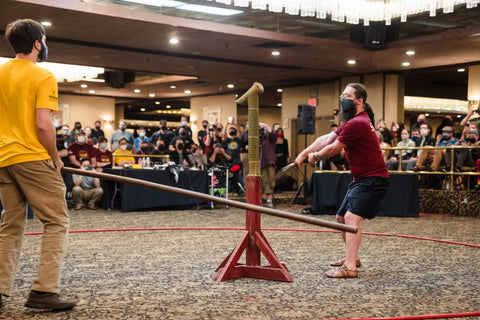 SoCal Swords instructor cuts through tatami after parrying wooden staff at SoCal Swordfight 2022