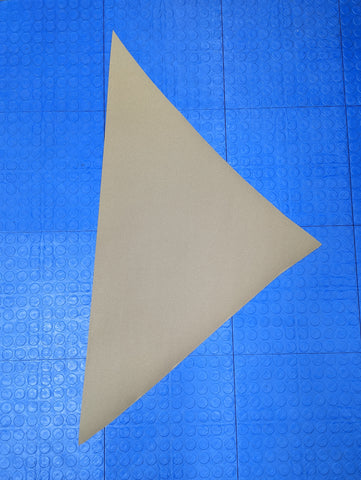 Paper cut into a triangle shape due to cuts coming from opposing angles