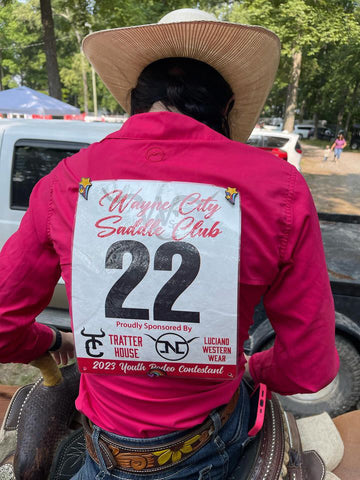 pinsnickety horse show number pins on a barrel racing outfit