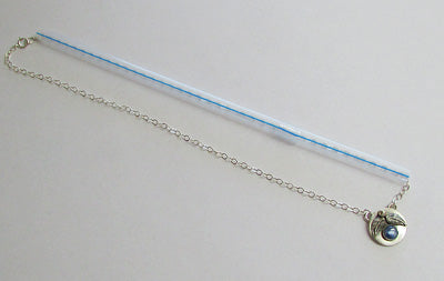 Necklace chain through straw